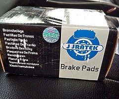 Rear brake disks and pads