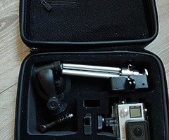 GoPro Hero 4 Black with case, spare battery, GoPro harness and GoPro suction mount