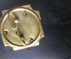 Small brass alarm clock