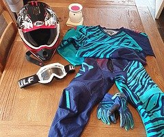 Kids helmet and motorbike outfit