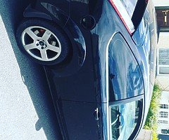 09 3 door black Ford Focus