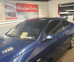 Window tinting and vehicle wrapping