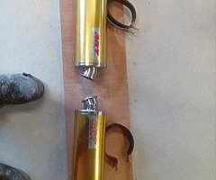 2 motorcycle exhausts bandit