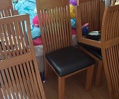 Oak table & chairs..matching unit for sale