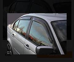 Wind deflectors front and rear