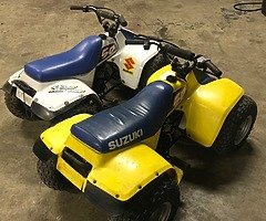 Two Suzuki lt50