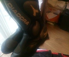 Textile motorcycle jacket and trousers and boots