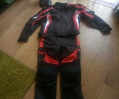 Textile motorcycle jacket and trousers and boots