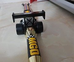 Miller f1 car only 10 made. And glassware