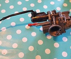 Anyone have a carburetor for 100cc unilli quad