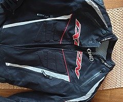 Men's Motor suit. size M