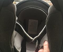 Selling a motorbike helmet no longer use few scrapes and marks on it but do some1 starting off size 