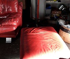 Three piece red leather sofa