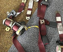 Selling Red seat belts out of a toyota corolla g6r