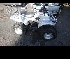 100 cc quad missing a head light