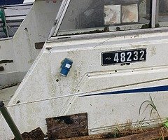 Looking for owner of sinking boat