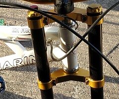Downhill mountain bike in good condition not being used lying in a shed