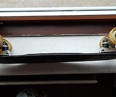 Nickel/cruiser board with black spitfire bearings. (Price can be negotiated)