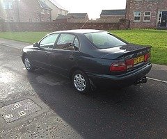 £875
