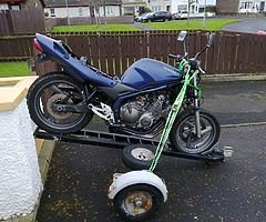 £295