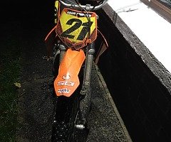 £450