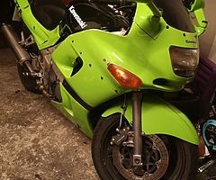 £700