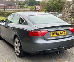 £7,300