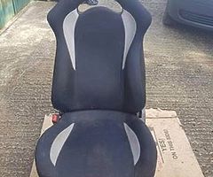 Bucket seats and exhaust