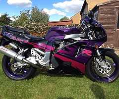 £750