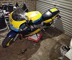£100