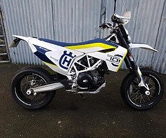 £7,400