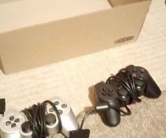 Original PS2 in good condition and cums with memory card