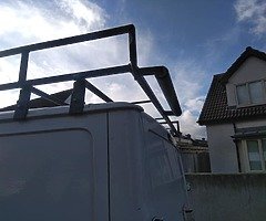 Roof rack with roller...