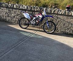 Two stroke dirt bike wanted , 125 or 250 , anything considered Suzuki Honda Kawasaki