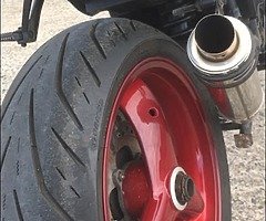 Selling a 2004 triumph Streetfighter with an R1 tail.