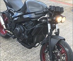 Selling a 2004 triumph Streetfighter with an R1 tail.