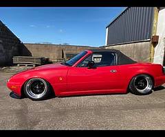 Silver wrapped red door shuts not done.