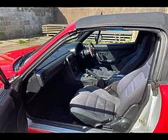 Silver wrapped red door shuts not done.