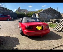 Silver wrapped red door shuts not done.