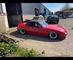 Silver wrapped red door shuts not done.