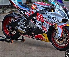 Lookin sports bike must be mint! 750 or 1000 with pipe on her ect.... Gsxr r1 gsx s 750 fireblade bm