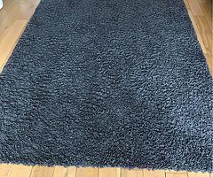 Shaggy grey rug