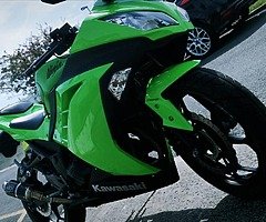 Kawasaki Ninja 300, 2015, only 2995 miles.