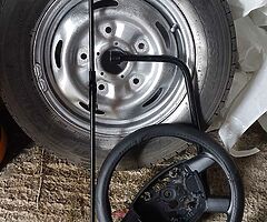 ford transit wheel brace and verry good tyre .and to back lights.and stering wheel .100.