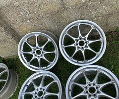 5 18 inch alloys wheels and 
5 good tyres size 215/35/r18