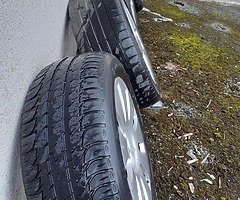 4 ALLOYS,1 ODD IS 16" THE OTHERS ARE 17"