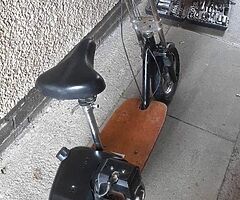 Looking petrol scooter