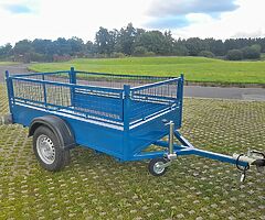 Brand new 7by4 steel single axle trailer with mesh sides