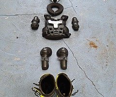 Motocross helmet and boots plus body armor