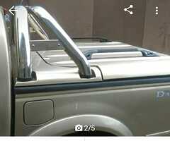 Sports lid and roll bar